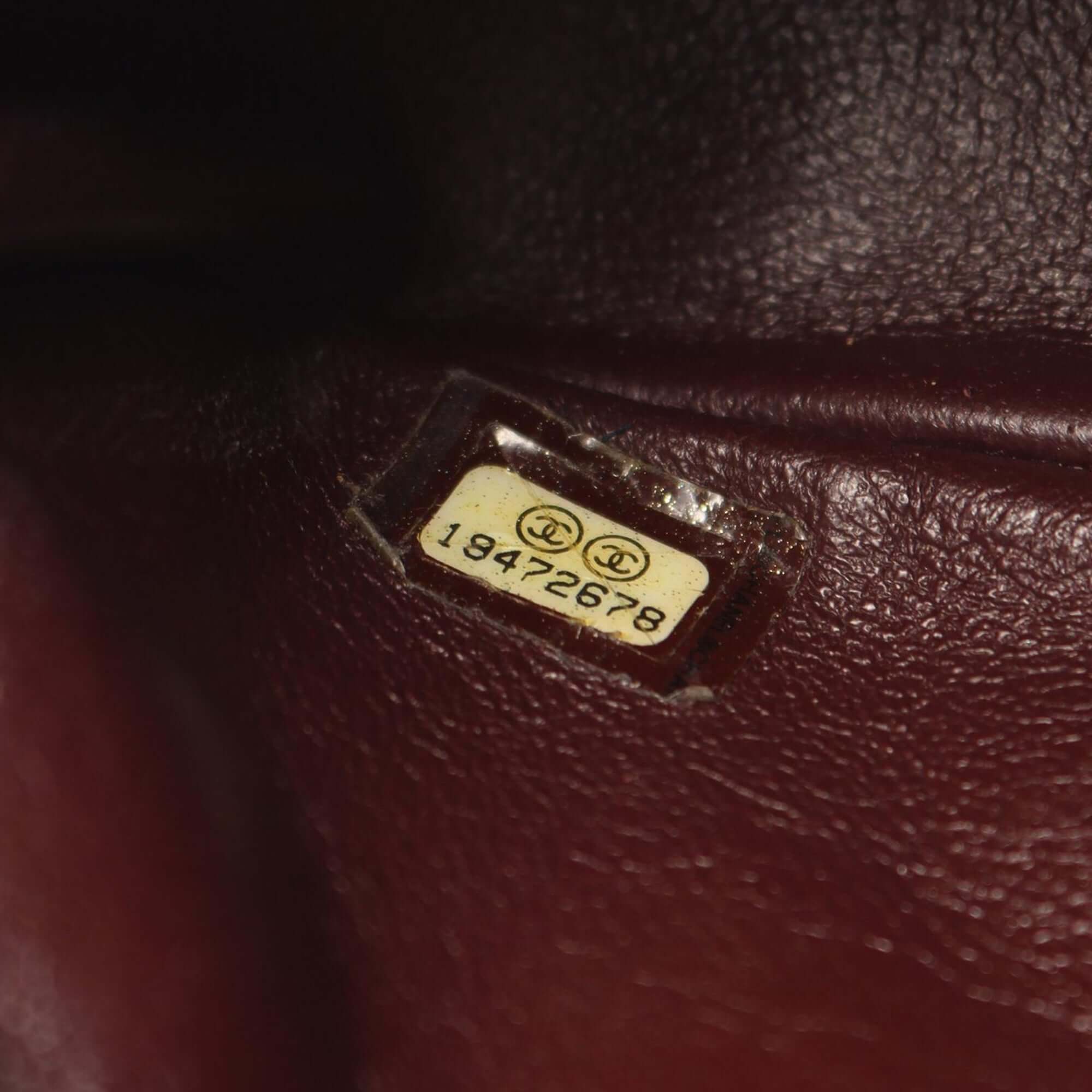 Chanel CC Quilted Lambskin Camera Crossbody