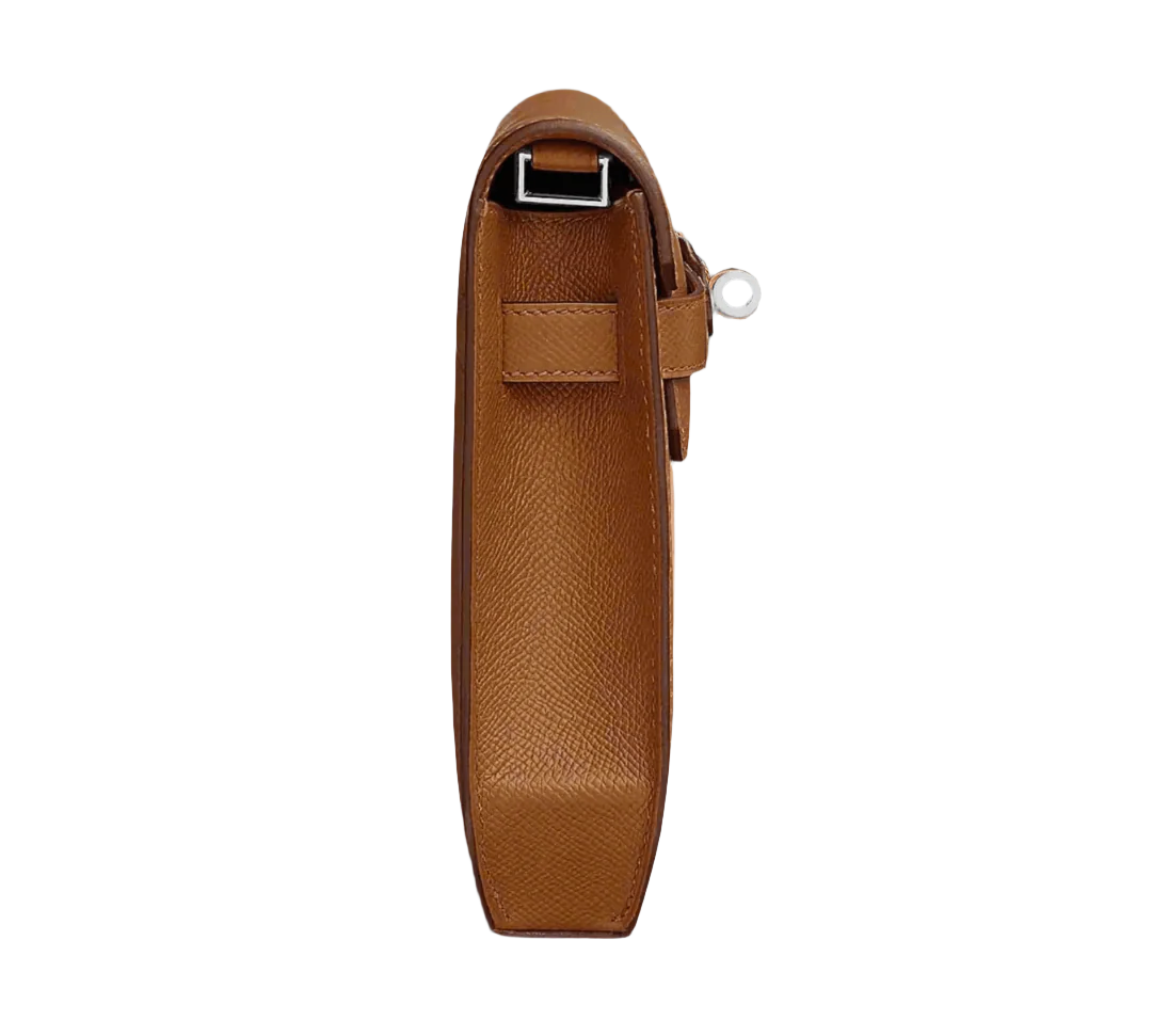 Side view on an hermes depeches 25 in gold epsom in phw hardware