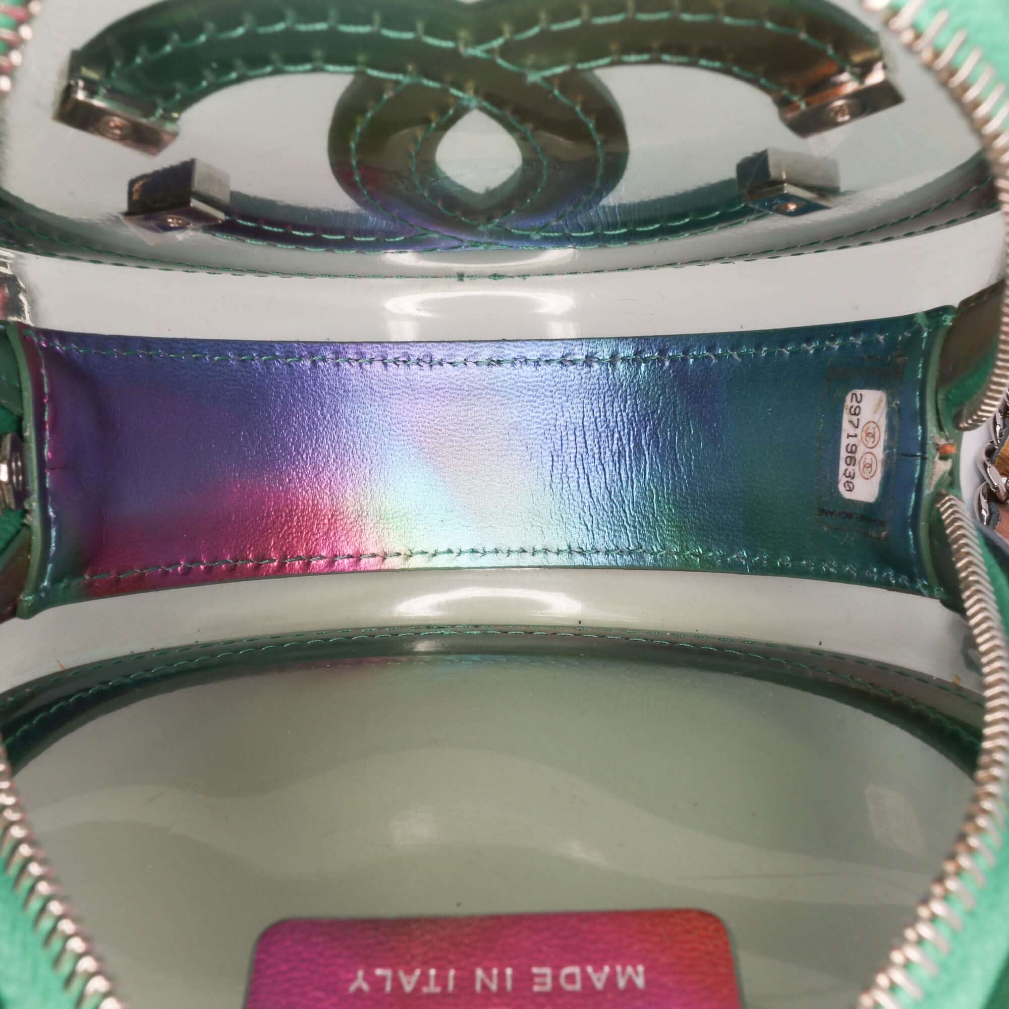 Chanel PVC and Metallic Lambskin CC Filigree Round Clutch with Chain