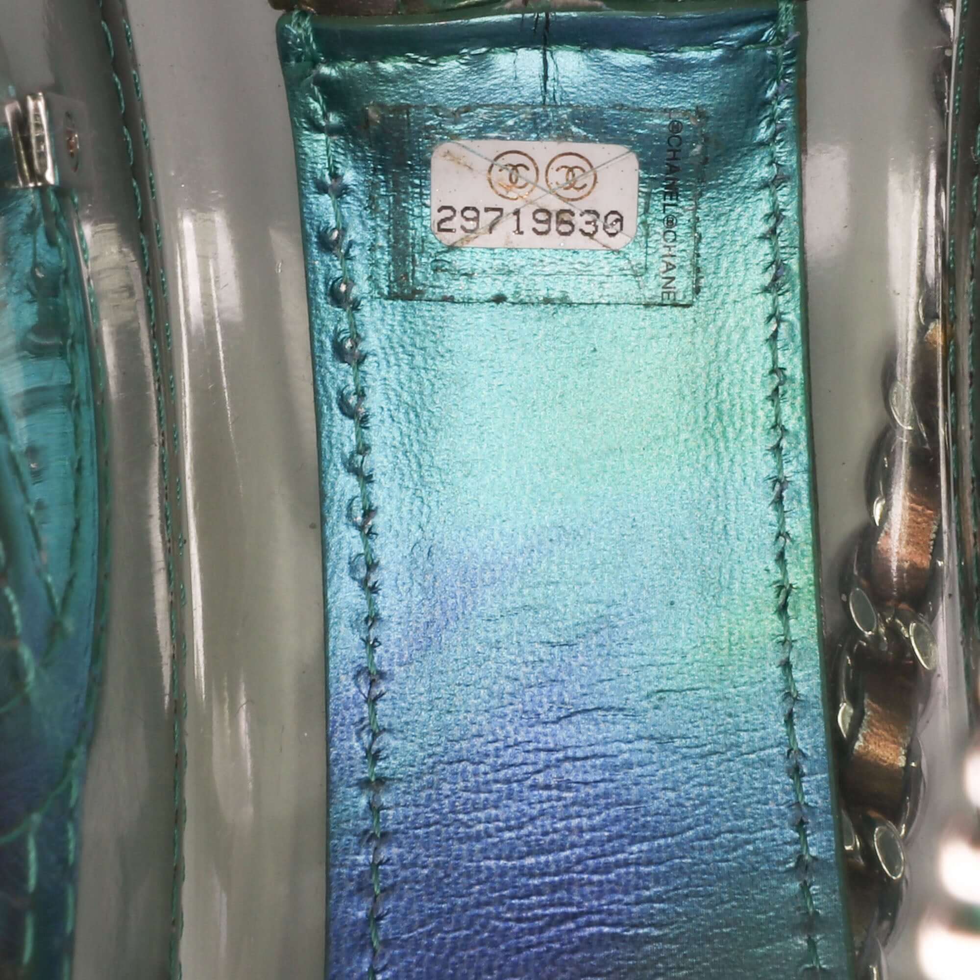 Chanel PVC and Metallic Lambskin CC Filigree Round Clutch with Chain