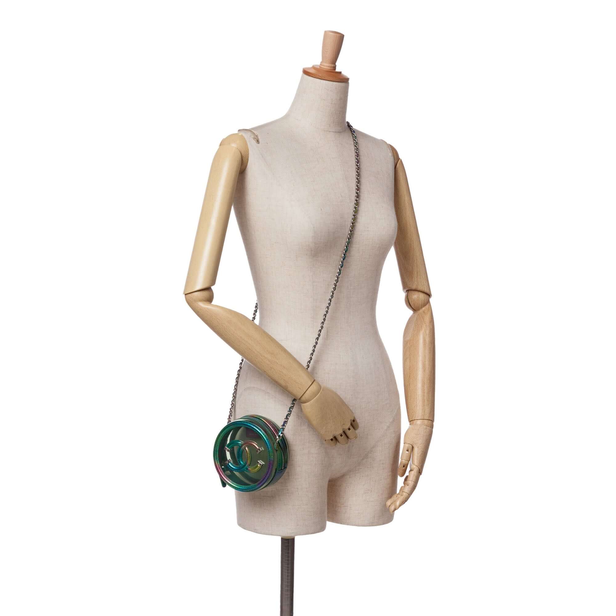 Chanel PVC and Metallic Lambskin CC Filigree Round Clutch with Chain