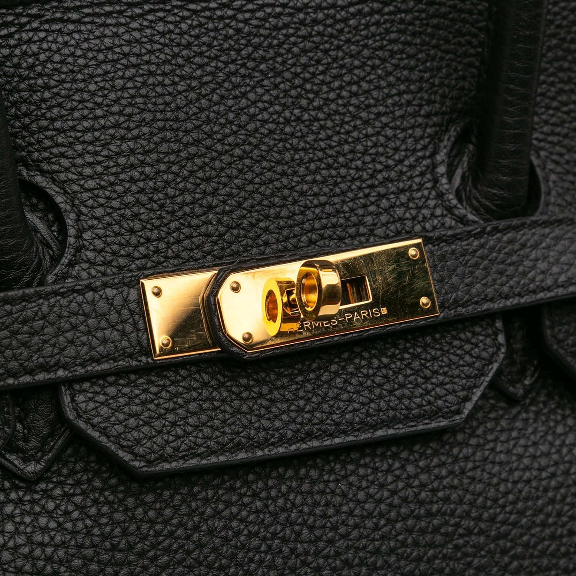 close up image of the front hardware of an Pre-loved Hermès Birkin 35 Black Togo Leather Handbag from 2012 
