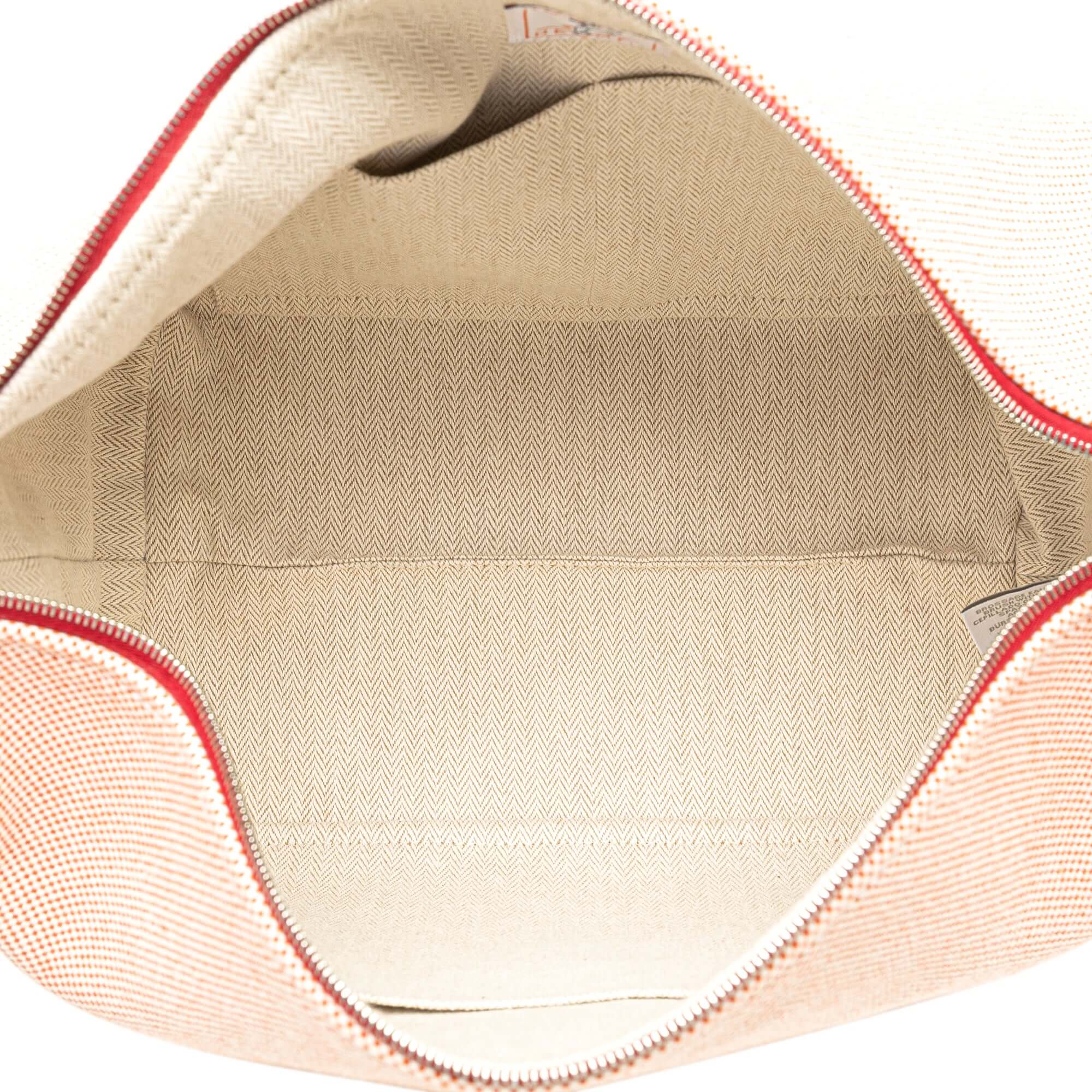 Pre-loved Hermès large Bride-A-Brac terracotta canvas travel case with zip and handle
