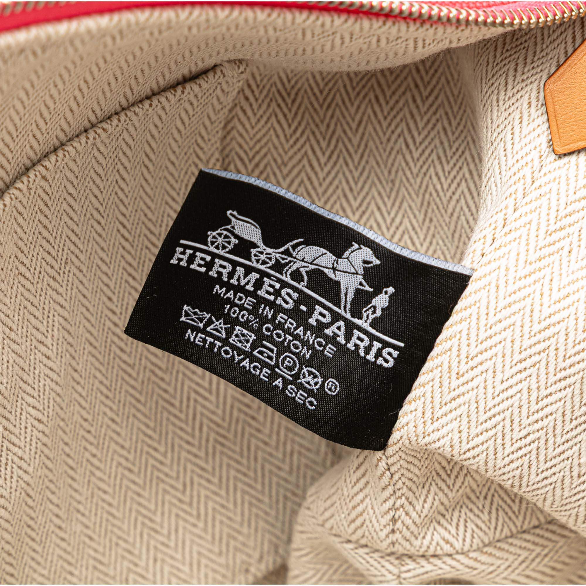 Pre-loved Hermès Small Bride-A-Brac pink canvas pouch with handle and zipper
