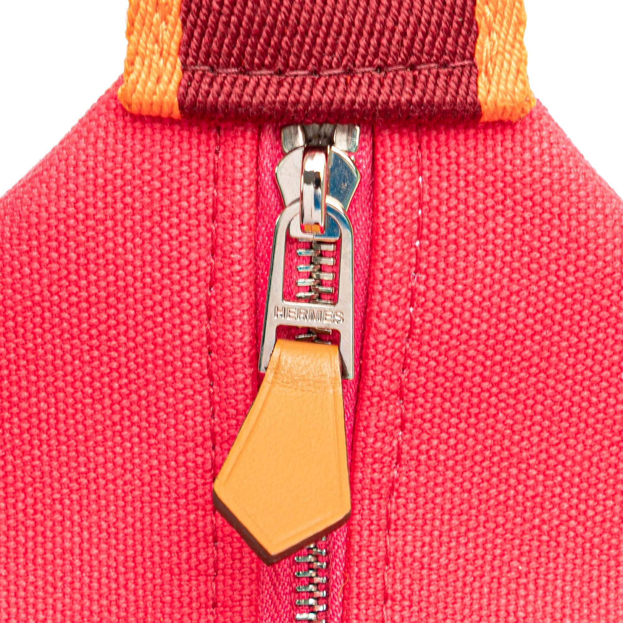 Pre-loved Hermès Small Bride-A-Brac pink canvas pouch with handle and zipper
