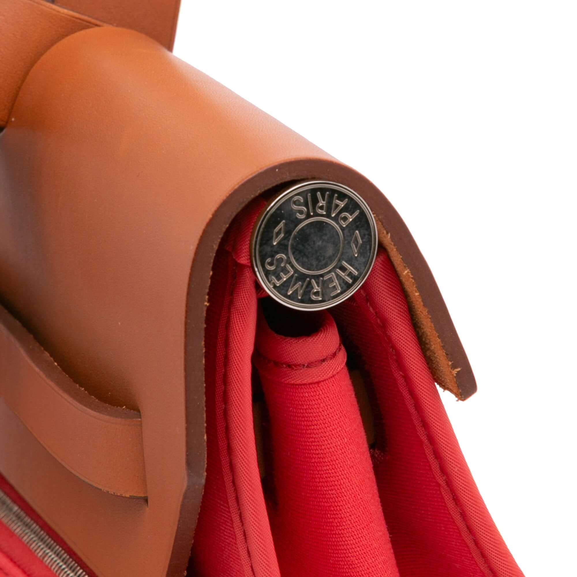 close up image of a Pre-loved Hermès Herbag Zip 39 in pink canvas with leather trim and detachable pouch
