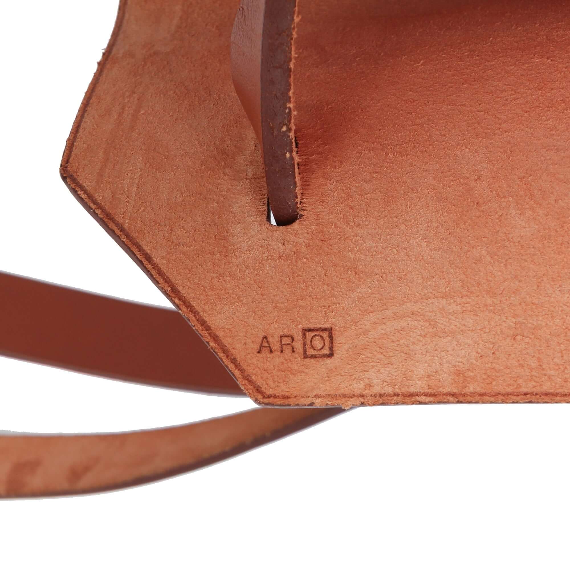 close up image of the stamp from a Pre-loved Hermès Herbag Zip 39 in pink canvas with leather trim and detachable pouch
