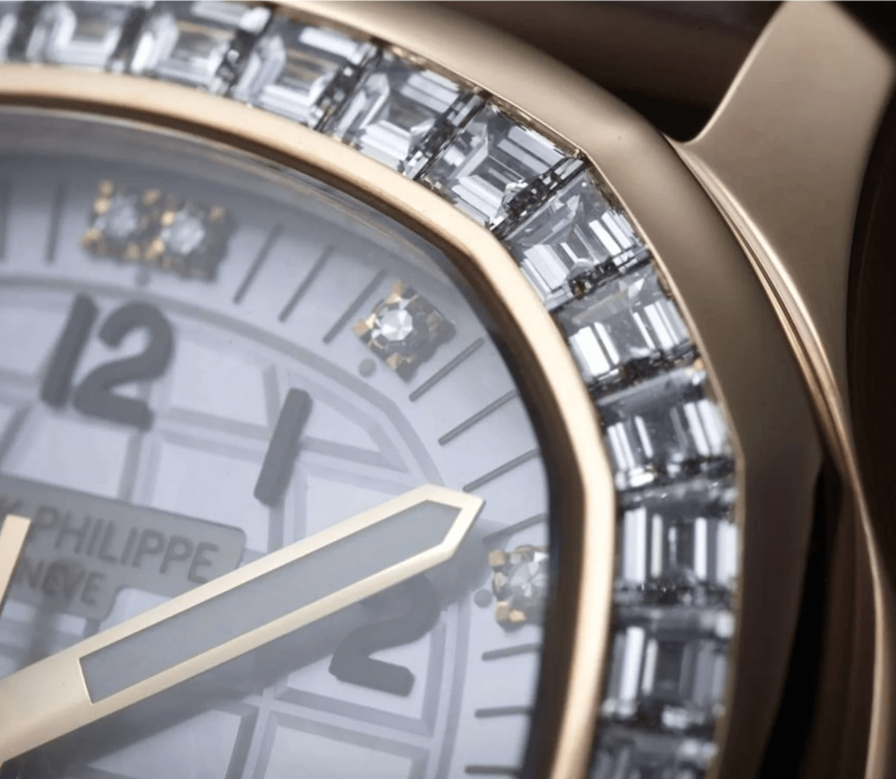 Super Close up Patek Philippe Aquanaut 5072R-001 in rose gold with mother-of-pearl dial and baguette diamond bezel
